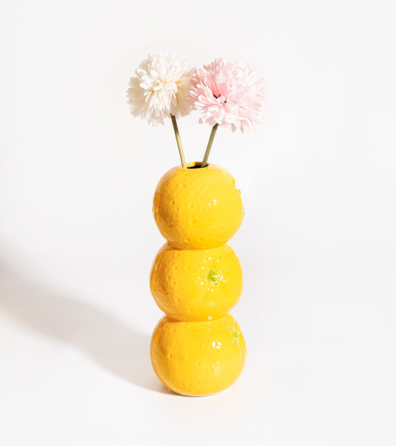 Vase fruits empilés