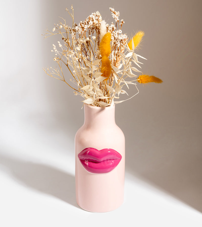 Vaso in ceramica con labbra rosse