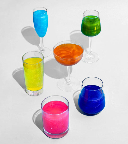 Bombe glitterate arcobaleno per cocktail