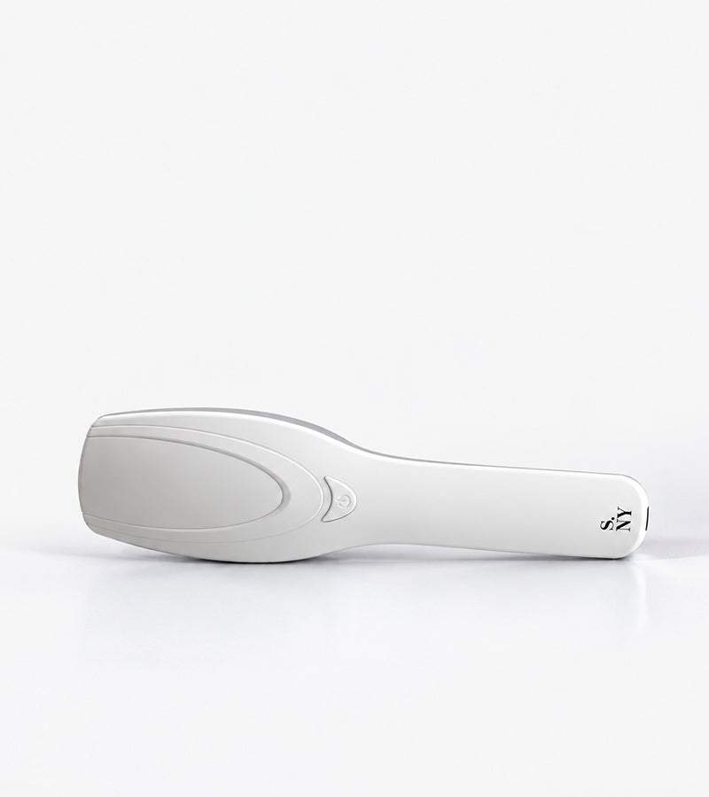 Spazzola LED stimolante per il cuoio capelluto