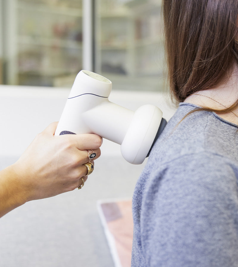 Pistola massaggiatrice multifunzione