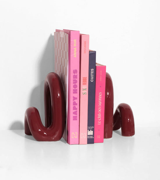 Fermalibri di design 