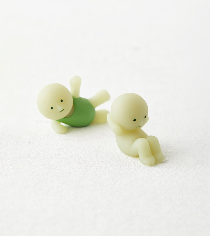 Figurine fluorescente Smiski - série Exercising 