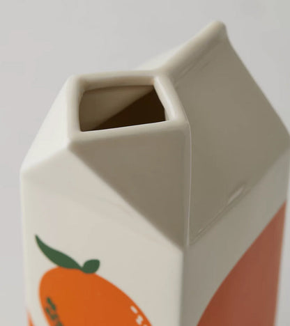 Vase brique de jus d'orange  Ban.do