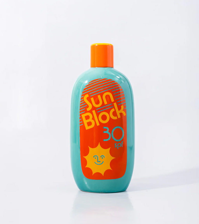 Vase crème solaire