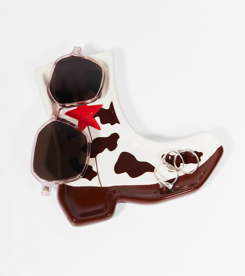 Svuotatasche Santiag a tema mucca